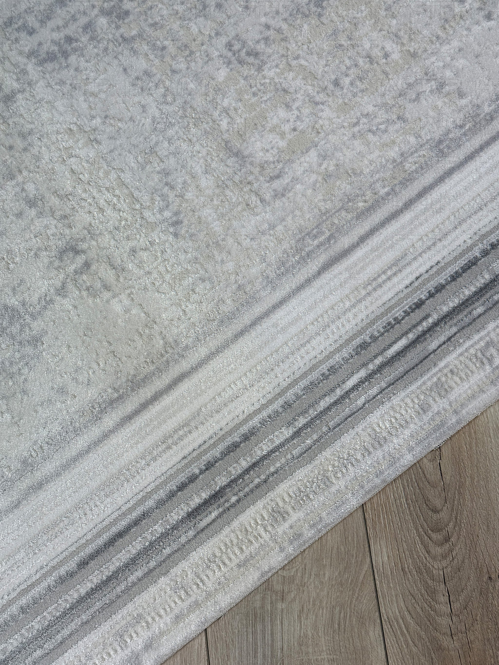 Kumru Minimalist Çizgili Bordürlü Eskitme Görünümlü Gri Kesme Halı
